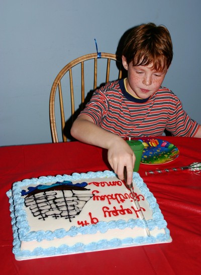 James cuts his birthday cake